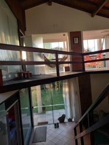 a view of a house with a balcony at Caiowa Floripa guesthouse in Florianópolis