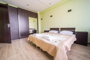 Postel nebo postele na pokoji v ubytování 2-room Apartment NFT Gudauri Penta 501 + 21 fotografií