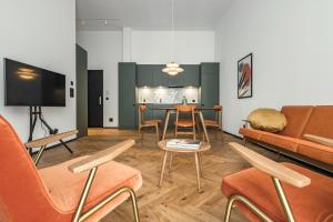 TV a/nebo společenská místnost v ubytování Alpenclub