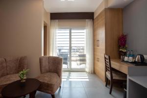 Posezení v ubytování Hotel Palm International