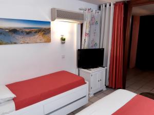 Postel nebo postele na pokoji v ubytování Studio Climatisé - Piscine-Plage - 2 à 3 personnes
