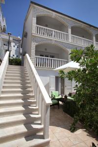 a stairway leading up to a house at Apartments MJM in Trogir