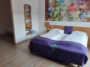 Postel nebo postele na pokoji v ubytování Family Hotel Schloss Rosenegg