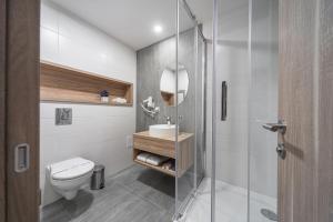 Koupelna v ubytování Amarant Urban Hotel & Conference Center by CHM