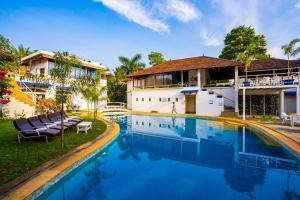 a view of the pool at the villa at Moustache Goa Luxuria in Vagator