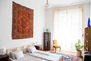 Ένα ή περισσότερα κρεβάτια σε δωμάτιο στο Sipi Apartman