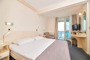 Postel nebo postele na pokoji v ubytování Hotel Gran Vista Plava Laguna