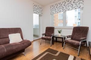 Posedenie v ubytovaní Karawela Gdańsk Apartments by Noclegi Renters
