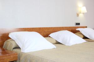 Postel nebo postele na pokoji v ubytování Hotel Vila-real Azul