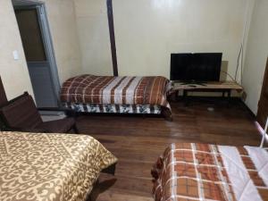 Letto o letti in una camera di Montano Camping & Hostel