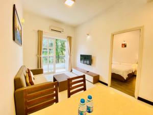 Giường trong phòng chung tại Pearl Service Apartment