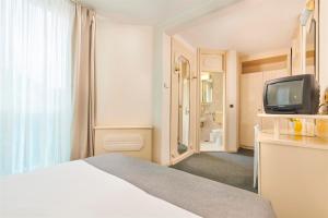 Postel nebo postele na pokoji v ubytování Hotel Gran Vista Plava Laguna