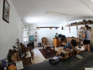 a group of people in a living room at Tuncay Pension in Selcuk