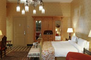 Ένα ή περισσότερα κρεβάτια σε δωμάτιο στο Albergo Hotel