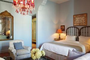 Ένα ή περισσότερα κρεβάτια σε δωμάτιο στο Albergo Hotel