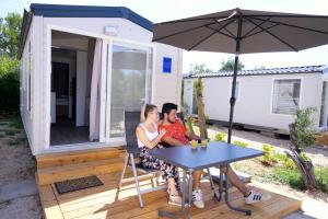 Патио или другая зона на открытом воздухе в Mobile Homes Camping Kovačine