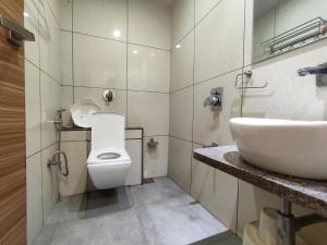 Koupelna v ubytování Hotel Pragati