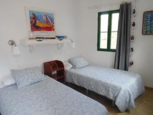 Postel nebo postele na pokoji v ubytování Casa La Poyata - Taganana