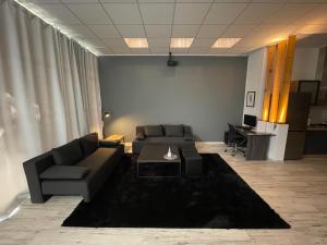 A seating area at Cinema Zeus Studios - by Avelink