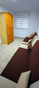 Katil atau katil-katil dalam bilik di Apartman Mis Divcibare