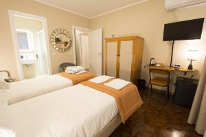 Postel nebo postele na pokoji v ubytování Villa Jasmine B&B