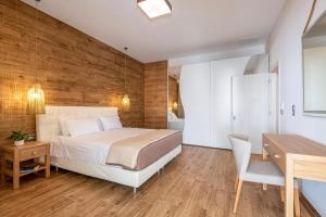 Postel nebo postele na pokoji v ubytování Residence