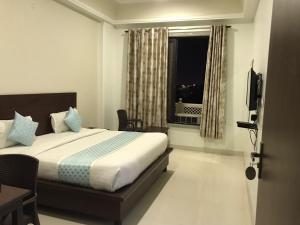 Postel nebo postele na pokoji v ubytování Jeenmount Heritage Boutique Hotel