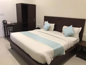 Postel nebo postele na pokoji v ubytování Jeenmount Heritage Boutique Hotel