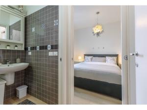 Ванна кімната в Lazzaretto a 5 min dall'Aeroporto Apartment