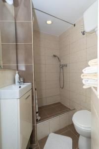 Koupelna v ubytování Apartman Gomirje