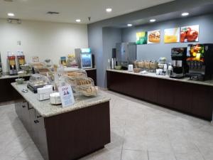 a store with a bakery with aasteryasteryasteryasteryasteryasteryasteryasteryastery at Ramada Suites by Wyndham San Diego in San Diego