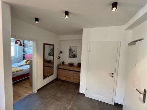 Postel nebo postele na pokoji v ubytování Alpin Art Appartements