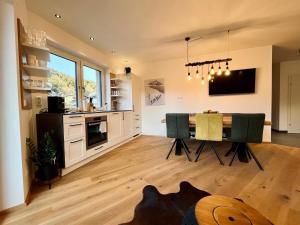 Kuchyň nebo kuchyňský kout v ubytování Alpin Art Appartements