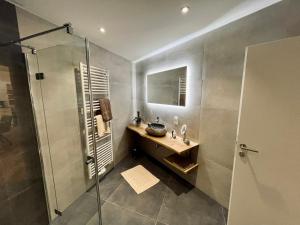 Koupelna v ubytování Alpin Art Appartements