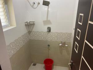 Koupelna v ubytování Hotel Akshith Inn