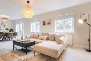 a living room with a couch and a table at Hareshaw House in Bellingham