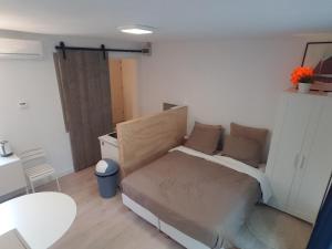Postel nebo postele na pokoji v ubytování Studio Badstrand