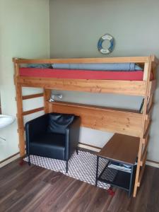 
Ein Etagenbett oder Etagenbetten in einem Zimmer der Unterkunft Hostel Rotschuo Jugend- und Familienferien
