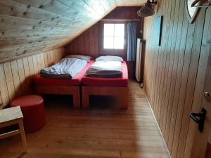 Postel nebo postele na pokoji v ubytování Hostel Rotschuo Jugend- und Familienferien