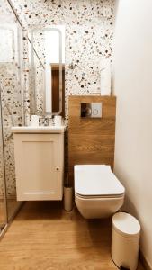 Koupelna v ubytování Daszyńskiego 18 by Homeprime + 6 fotografií