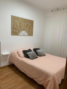 Postel nebo postele na pokoji v ubytování Centro Monumental