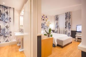 Postel nebo postele na pokoji v ubytování Cinque Rooms