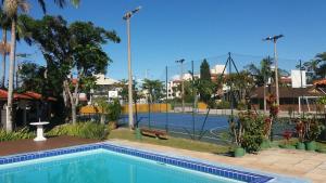 Chalé em Condomínio com piscina - Ponta das Canas游泳池或附近泳池