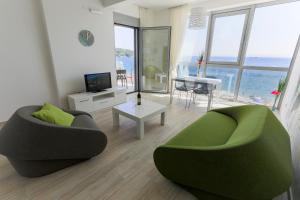 TV a/nebo společenská místnost v ubytování Apart Hotel Sea Fort