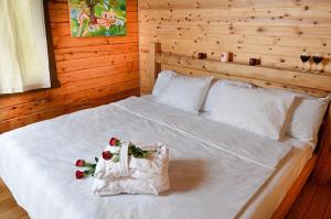 Кровать или кровати в номере Yagorov Chalet