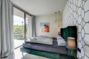 Postel nebo postele na pokoji v ubytování Villa Colombo + 34 fotografií