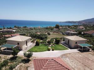 an aerial view of a house with a large yard at TAKIS BIZOS House 1 in Koroni