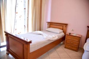 Postel nebo postele na pokoji v ubytování Hotel Geraldo