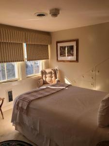 Ένα ή περισσότερα κρεβάτια σε δωμάτιο στο Cliff Lodge
