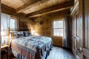 Ένα ή περισσότερα κρεβάτια σε δωμάτιο στο Bluebeary Bungalow